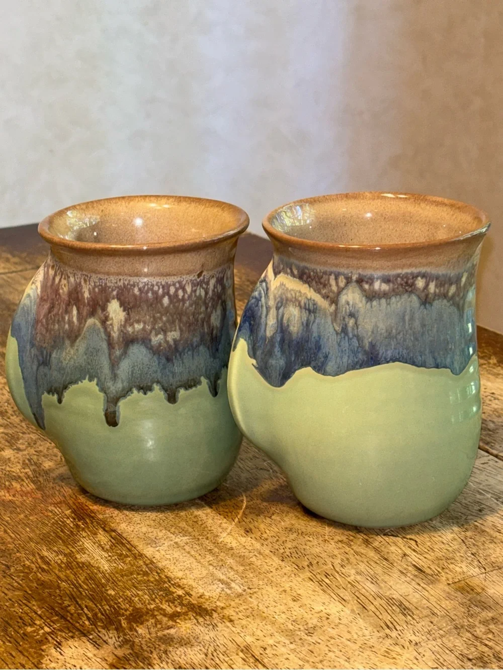 2013 & 2017 Neher Clay in Motion Mossy Creek Pottery Hand Warmer Mugs - Set of 2